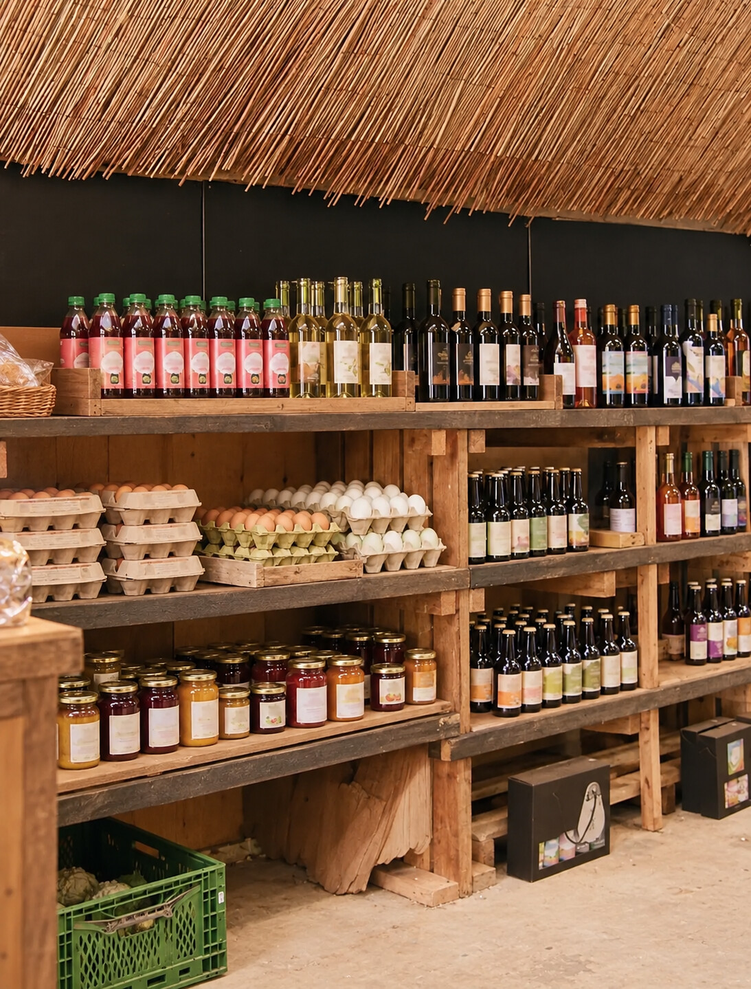 Farm shop shelf with jam, juice and eggs